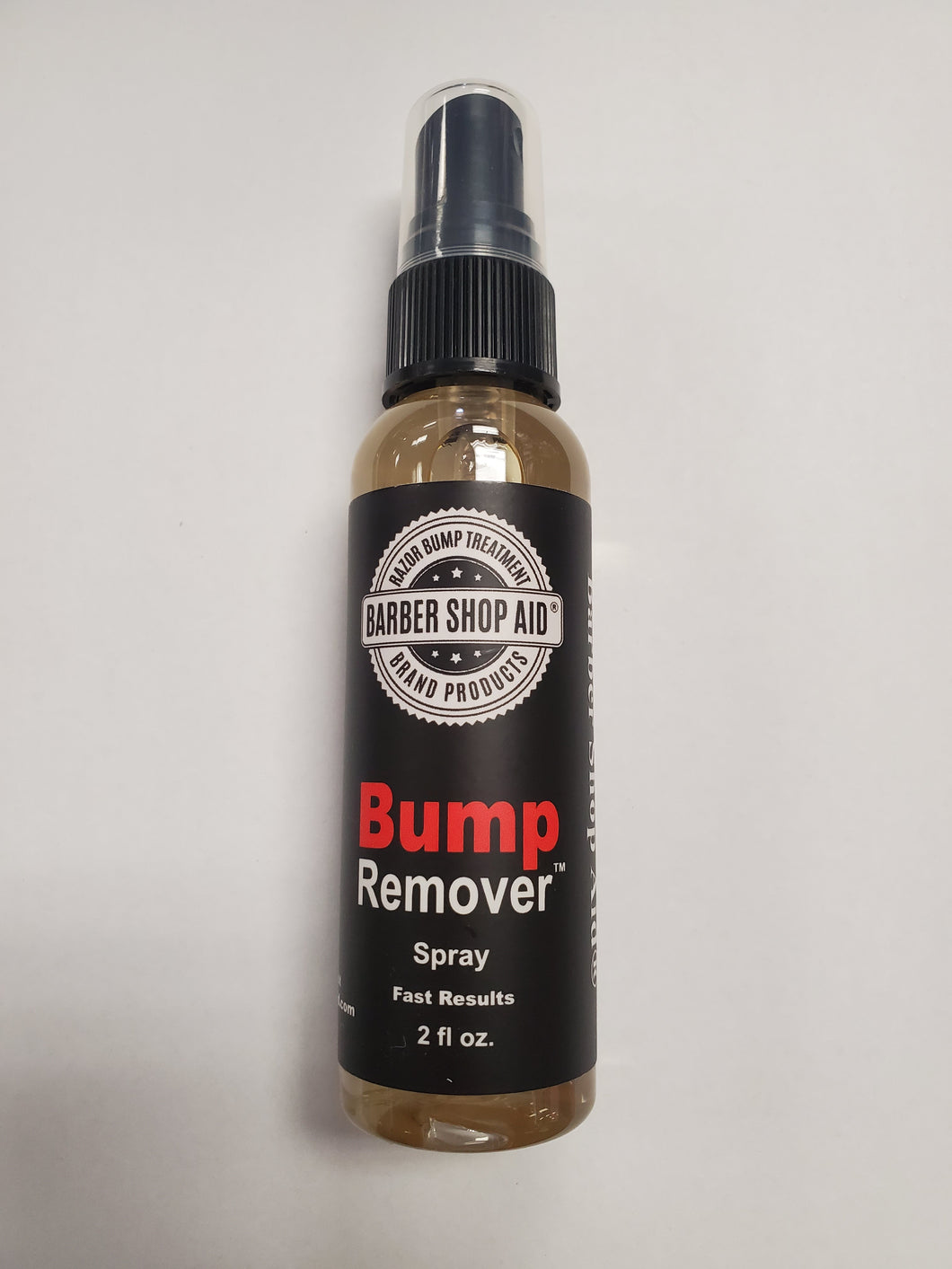 Barber shop aid bump remover spray